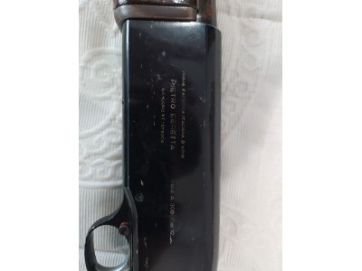 Escopeta repetidora Beretta 303