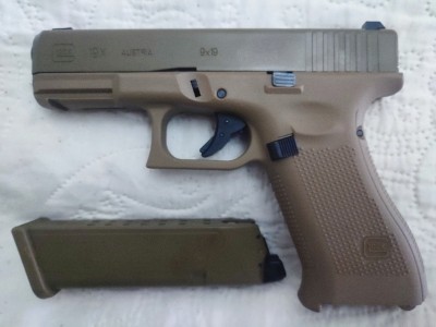 Pistola de airsoft Glock 19 tan umarex blowback