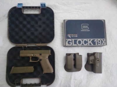 Pistola de airsoft Glock 19 tan umarex blowback