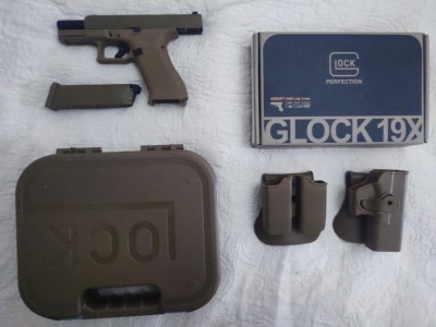 Pistola de airsoft Glock 19 tan umarex blowback