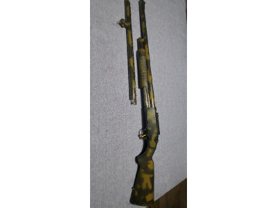 Mossberg de corredera cal 12 mag