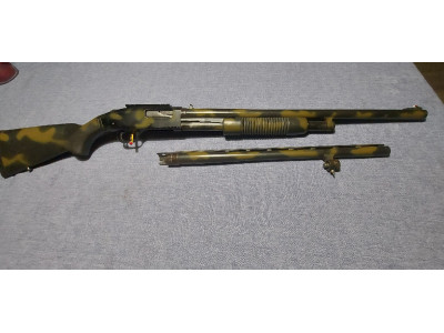 Mossberg de corredera cal 12 mag
