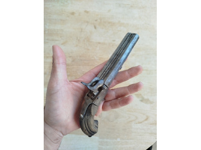 Pistola antigua 1.800