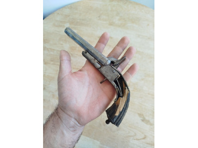 Pistola antigua 1.800