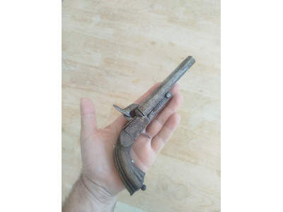 Pistola antigua 1.800