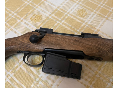 Rifle Sauer 100 con mira telescópica